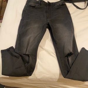 black ripped jeans , size 10